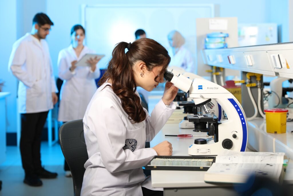 Scientist conducting laboratory research, illustrating the AITHYRA International PhD Programme 2027 in Austria