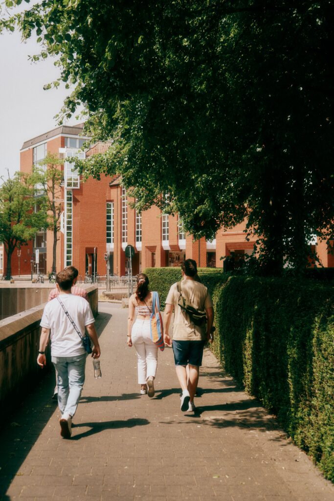 Students walking on a university campus – Axel Adler Scholarship 2027 in Sweden